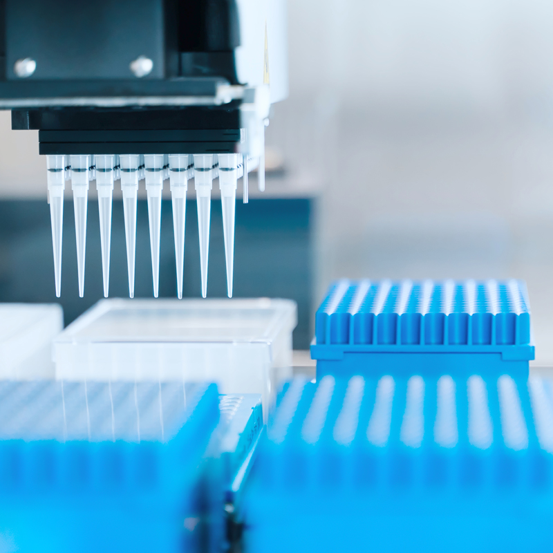 Automation in the clinical laboratory. Pipetting robot laboratory.